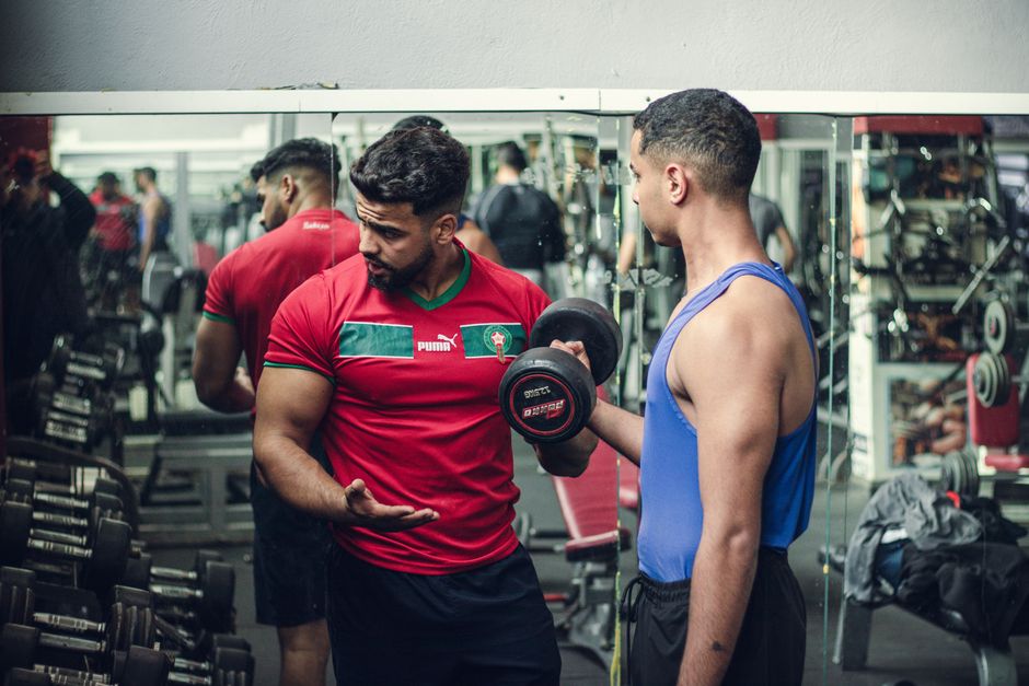 Personal trainer coaching a client